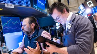 Traders work on the New York Stock Exchange floor on November 12, 2024 in New York City.