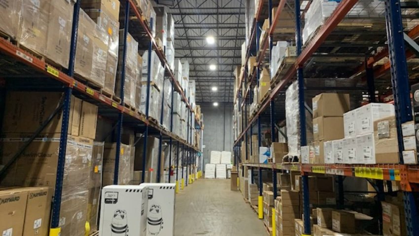 A warehouse for Texas Pool Supply, a company that’s part of SRS Distribution, carries pool parts like filters and heaters, along with large buckets of pool chemicals. It’s an example of the specialized business that Home Depot includes after acquiring SRS.