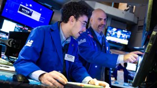 Traders work on the floor of the New York Stock Exchange on Nov. 22, 2024 in New York City.