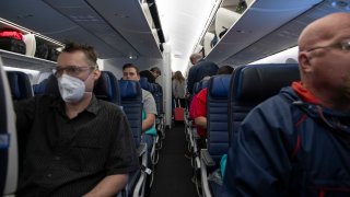 Passengers are boarding. United Airlines Boeing 787 Dreamliner aircraft interior. Flying a 9h flight, inside a United Airlines Boeing 787 airplane on a long haul transatlantic flight. 