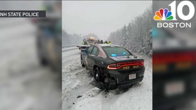 Driver charged after hitting NH State Police cruiser