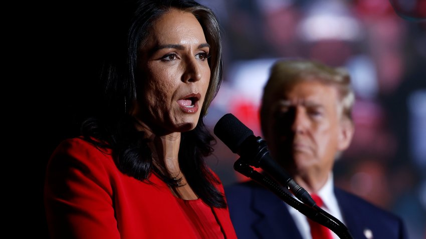 GREENSBORO, NORTH CAROLINA – OCTOBER 22: Former U.S. Representative from Hawaii Tulsi Gabbard speaks as Republican party as Republican presidential nominee, former U.S. President Donald Trump listens at a campaign rally at the Greensboro Coliseum on October 22, 2024 in Greensboro, North Carolina. With 14 days to go until Election Day, Trump continues to crisscross the country campaigning to return to office.