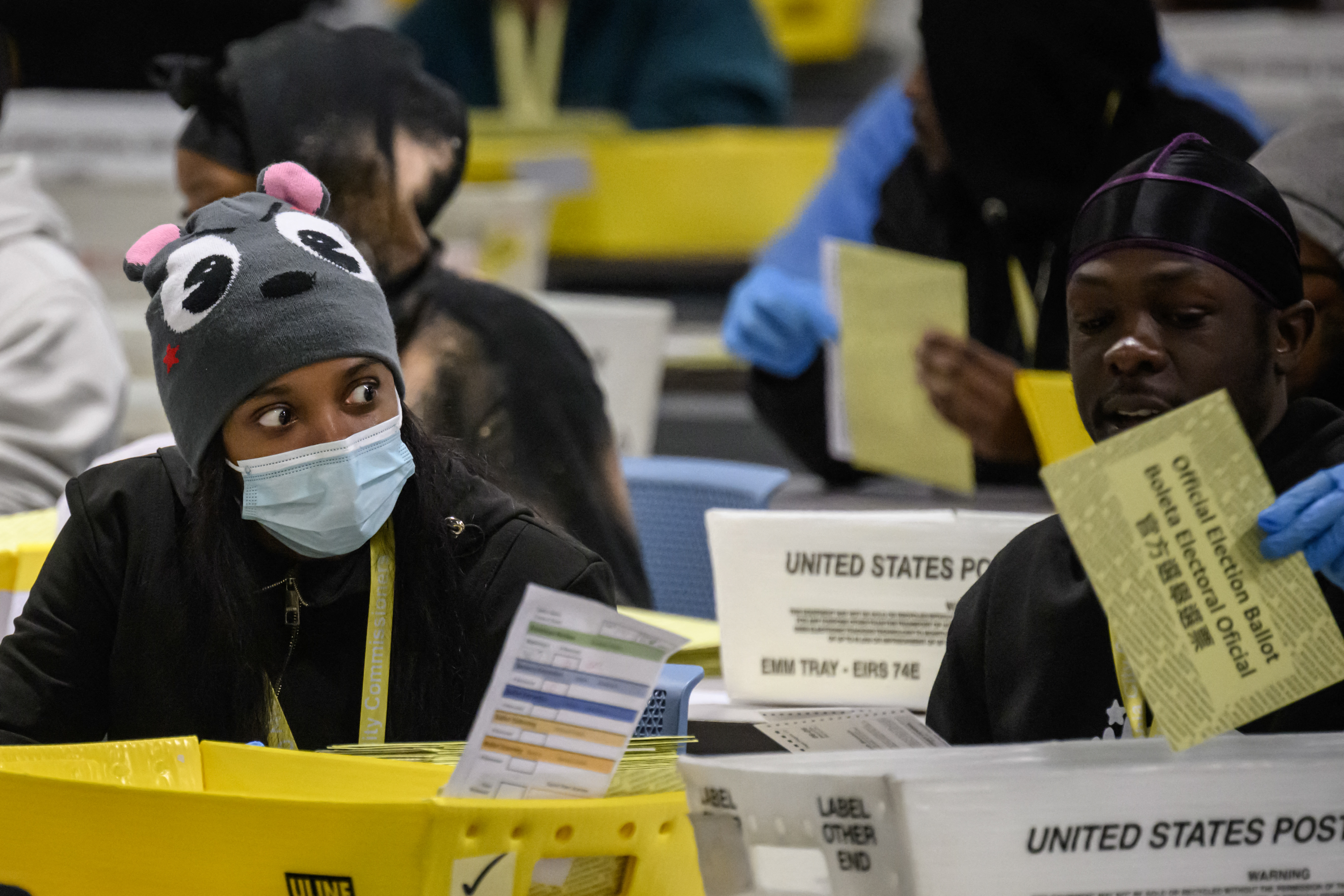 Philadelphia County board of elections staff process mail-in ballots at the ballot counting election warehouse on Election Day, on the outskirts of Philadelphia, Pennsylvania on November 5, 2024.