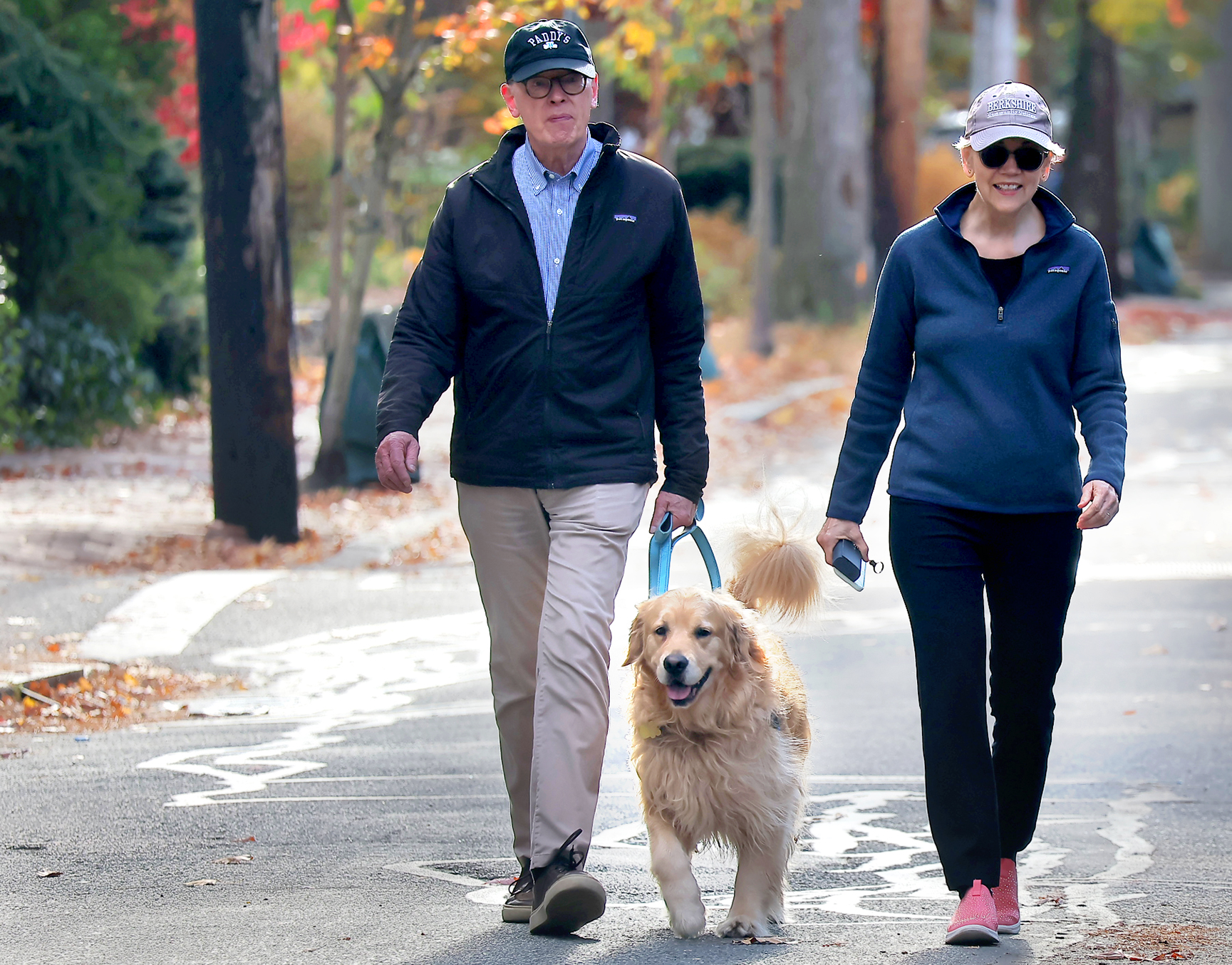 Cambridge, MA – November 5: US Senator Elizabeth Warren and her husband Bruce Mann walked with their dog Bailey to their polling place, the Graham and Parks School. (Photo by Lane Turner/The Boston Globe via Getty Images)