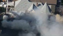 Heavy smoke across the sky in Somerville, Massachusetts, due to a house fire on Friday, Nov. 8, 2024.