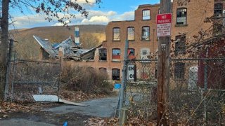 A partially collapsed building in Russell, Massachusetts, on Monday, Nov. 11, 2024.