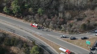 First responders at a ramp to I-95 in Boxford, Massachusetts, for a car crash.