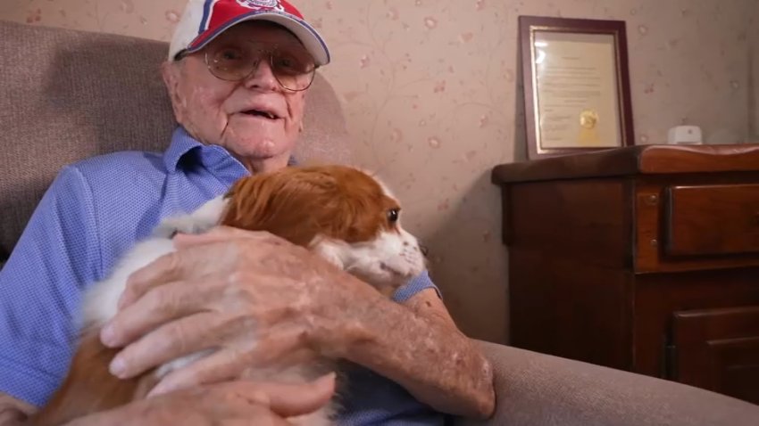 "Buddy" Shropshire and his dog, Puppy, at their home in Millis, Massachusetts.