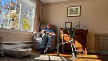 "Buddy" Shropshire and his dog, Puppy, at their home in Millis, Massachusetts.