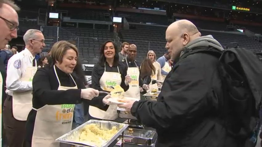 Massachusetts Gov. Maura Healey serves a Thanksgiving dinner at TD Garden for the 28th annual Table of Friends event on Wednesday, Nov. 27, 2024.