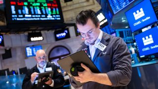 Traders work on the New York Stock Exchange floor on Nov. 12, 2024.