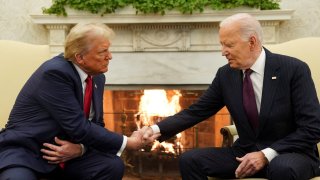 U.S. President Joe Biden meets with President-elect Donald Trump in the Oval Office at the White House in Washington, U.S., November 13, 2024. 
