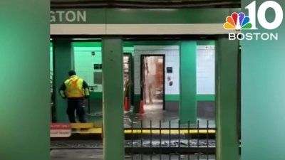 Water main break sends water flowing through MBTA stop