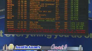 The arrivals board at Boston’s South Station showing delayed Amtrak trains on Dec. 23, 2024.