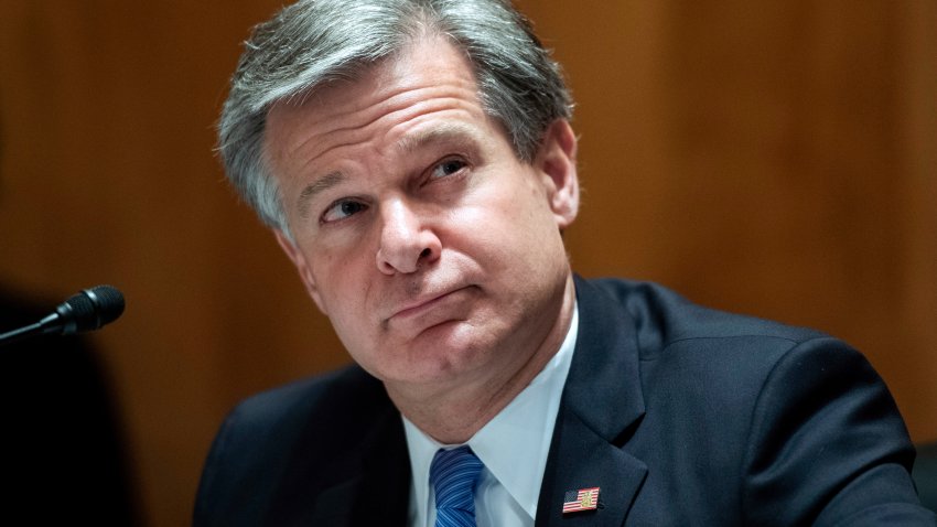 FILE - FBI Director Christopher Wray testifies on Capitol Hill in Washington, Sept. 24, 2020.