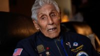 FILE – Pearl Harbor Navy veteran Bob Fernandez is photographed at home Tuesday, Nov. 19, 2024, in Lodi, Calif.