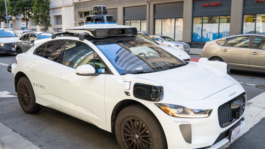 Waymo self-driving car navigating city traffic, San Francisco, California, August 20, 2024. (Photo by Smith Collection/Gado/Getty Images)