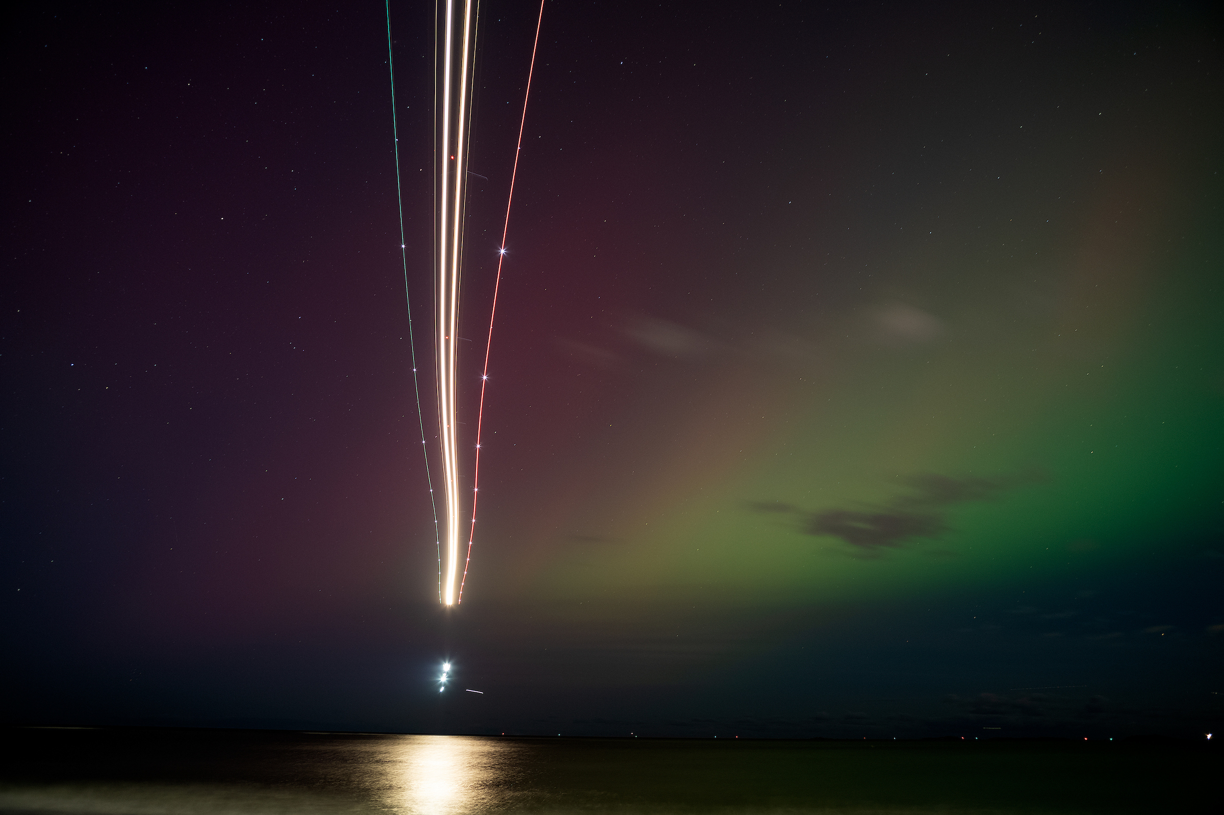 Oct. 10, 2024: The northern lights are seen on and near Boston’s Deer Island, thrilling people on the ground and on arriving airliners to Boston’s Logan airport alike.