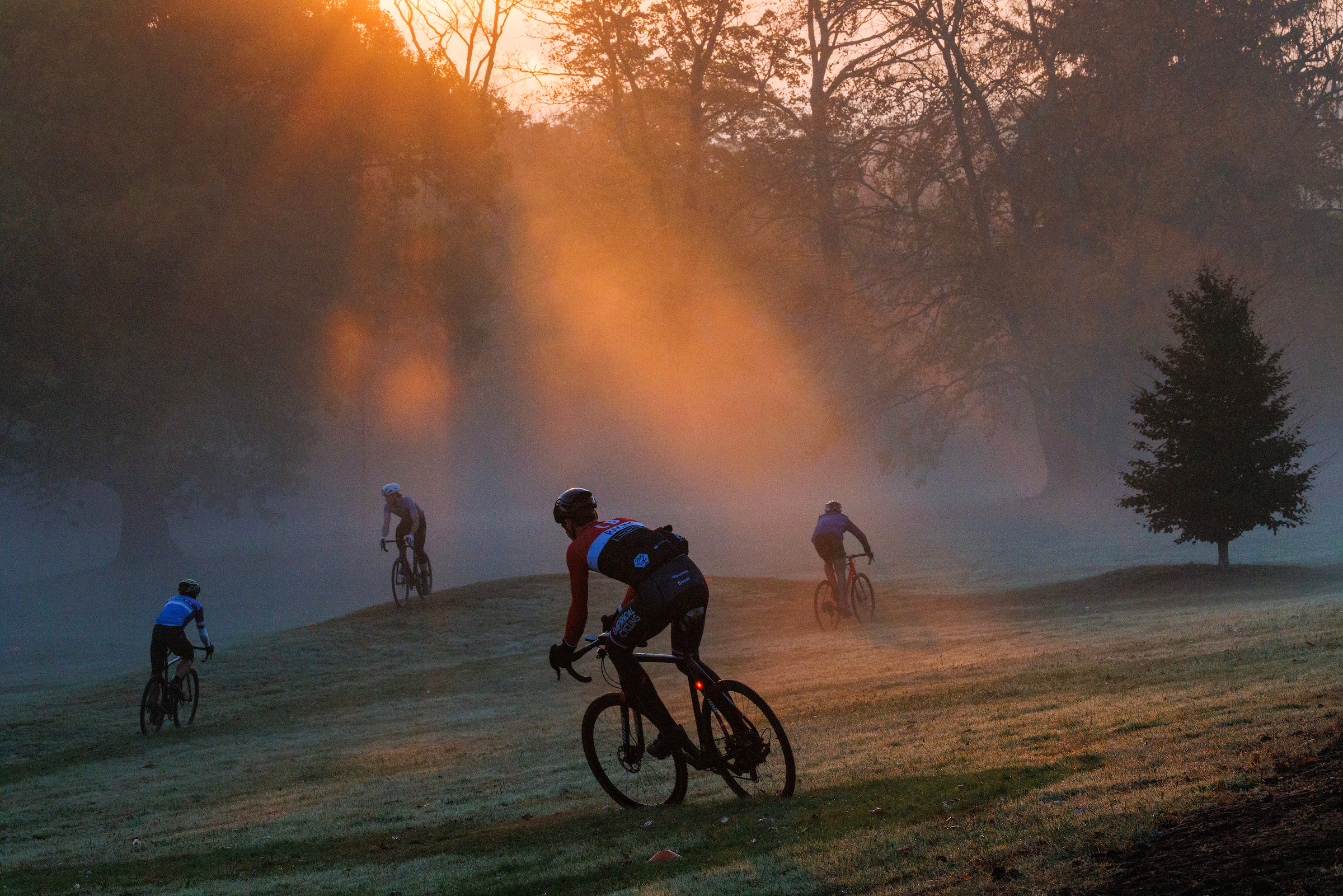 Oct. 23, 2024: Early morning fog and foliage surround bikers using Brookline’s Larz Anderson Park as their exercise venue.