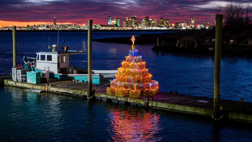 Dec. 6, 2024: The Boston sunset is framed by a lobster trap Christmas Tree in the Belle Isle section of Winthrop, along the Boston city line.