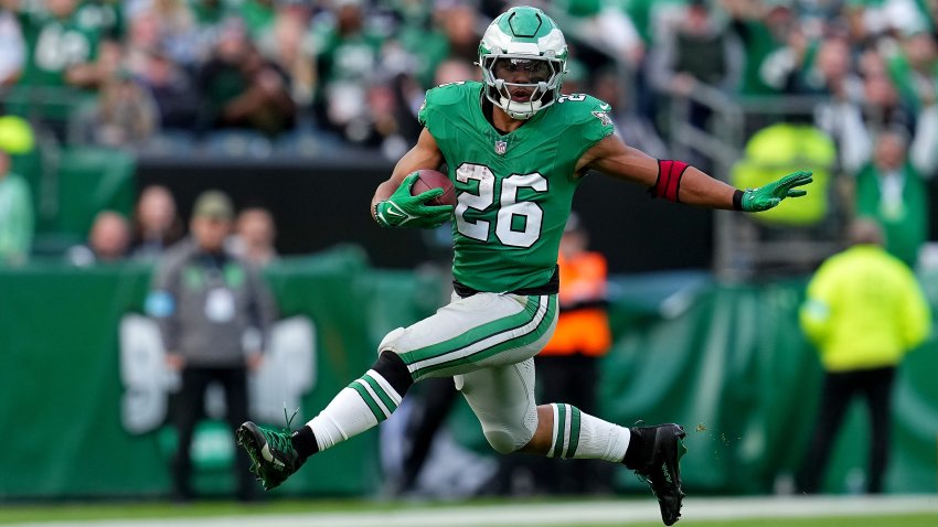 PHILADELPHIA, PENNSYLVANIA – DECEMBER 29: Saquon Barkley #26 of the Philadelphia Eagles runs the ball against the Dallas Cowboys during the third quarter at Lincoln Financial Field on December 29, 2024 in Philadelphia, Pennsylvania. (Photo by Mitchell Leff/Getty Images)