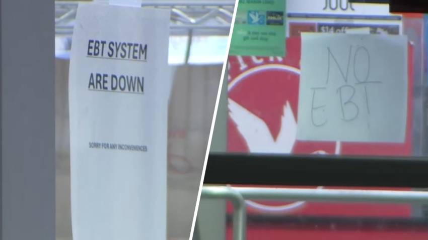 Signs on Wawa doors warn of an EBT SNAP payment outage
