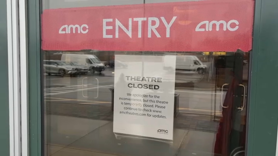 A note on the door at the AMC Methuen 20 Tuesday, Dec. 10, 2024.