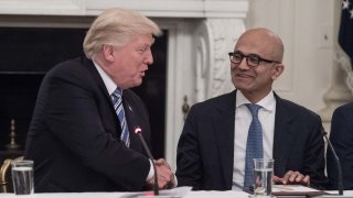 President Donald Trump shakes hands with Microsoft CEO Satya Nadella during an American Technology Council roundtable at the White House in Washington on June 19, 2017.