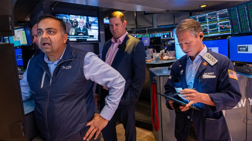 Traders work on the floor of the New York Stock Exchange (NYSE) on the first day of trading of the new year on January 02, 2025 in New York City. 