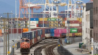 A Canadian National Railway locomotive pulls a train through the CPKC Waterfront Layover Yard on August 21, 2024 in Vancouver, British Columbia, Canada. 