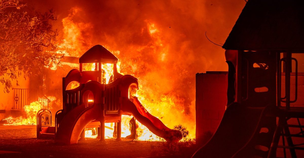 A playground burns in a residential neighborhood during the Eaton fire in Pasadena on Jan. 7, 2025.