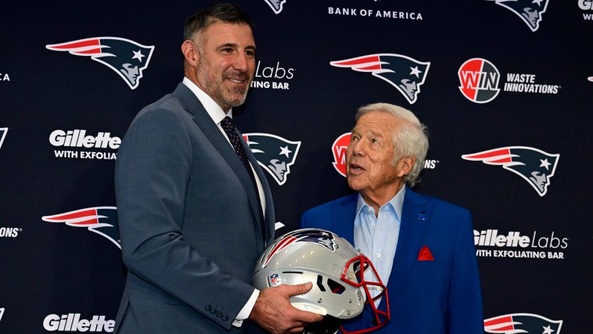 FOXBOROUGH, MASSACHUSETTS – JANUARY 13: Owner Robert Kraft (R) poses for a photograph with Mike Vrabel as Vrabel is announced as head coach of the New England Patriots during a press conference at Gillette Stadium on January 13, 2025 in Foxborough, Massachusetts.  (Photo by Billie Weiss/Getty Images)