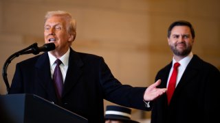 U.S. President Donald Trump speaks to the crowd as U.S. Vice President JD Vance looks on in the VIP overflow viewing area in Emancipation Hall after his inauguration at the U.S. Capitol on January 20, 2025 in Washington, DC. Donald Trump takes office for his second term as the 47th President of the United States. 