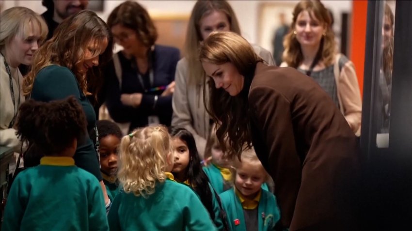 Catherine, Princess of Wales, with children at a museum.