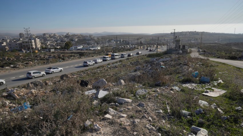 Motorists lineup at the Jaba checkpoint, near the West Bank city of Ramallah, Tuesday, Feb. 4, 2025.