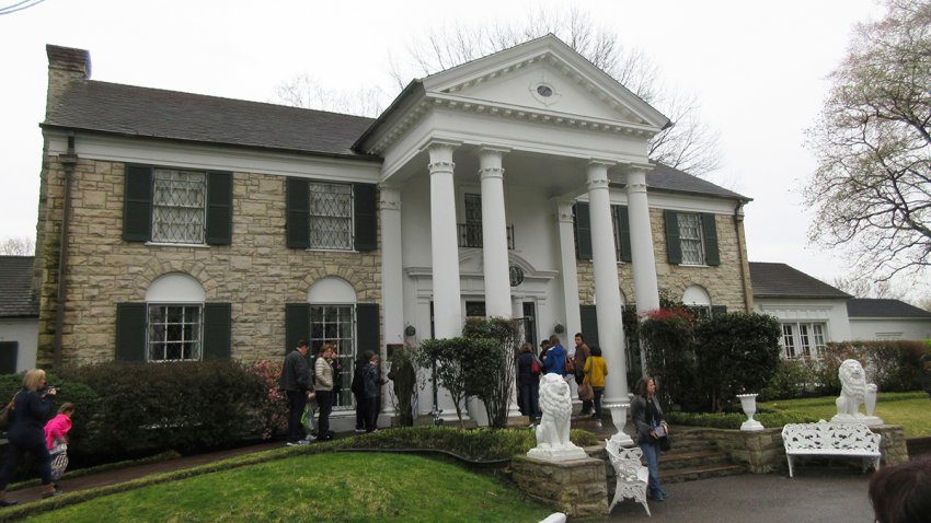 FILE - This March 13, 2017 photo shows visitors getting ready to tour Graceland in Memphis, Tenn.