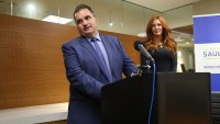 Everett Mayor Carlo DeMaria and his wife Stacy held a press conference at his lawyer’s office to discuss the $1.1 million settlement in his defamation lawsuit against the Everett Leader Herald.