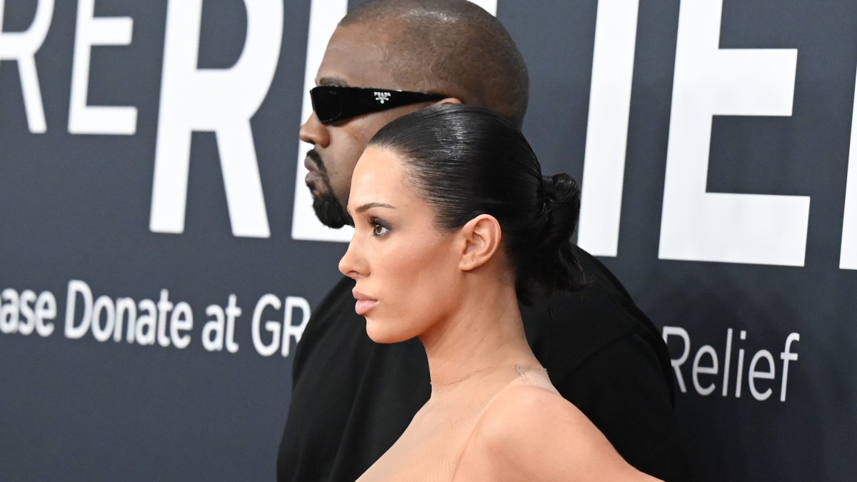 kanye west wife nude dress KANYE DEFENDS HIS WIFE'S GRAMMYS STUNT West is firing back at critics after his wife, Bianca Censori, shocked the Grammys red carpet with a nearly nude outfit. The rapper Kanye West's Aussie wife Bianca