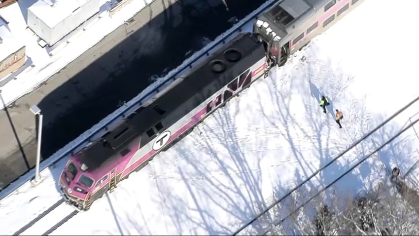 A coach on an MBTA commuter rail train derailed at the Readville train yard on Monday, Feb. 10, 2025.