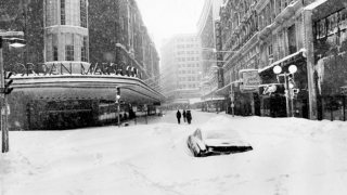 Caption: Boston’s Washington Street is buried in snow on Feb. 6, 1978, following the historic “Blizzard of 78”. Credit: David L. Ryan/The Boston Globe via Getty Images