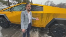Dr. Kumait Jaroje with his gold Tesla Cybertruck he says is prompting threats.