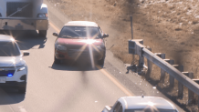 The suspect's car avoided police by driving onto the median.