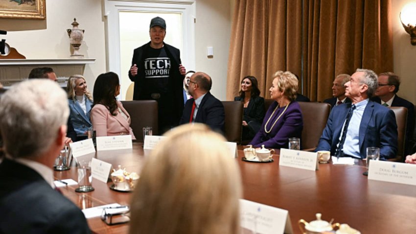 Leader of the Department of Government Efficiency Elon Musk wears a shirt that says “Tech Support” as he speaks during a cabinet meeting with US President Donald Trump at the White House in Washington, DC, on February 26, 2025. 