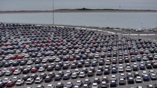 In an aerial view, brand new Subaru cars sit in a storage lot at Auto Warehouse Co. on March 4, 2025 in Richmond, California.