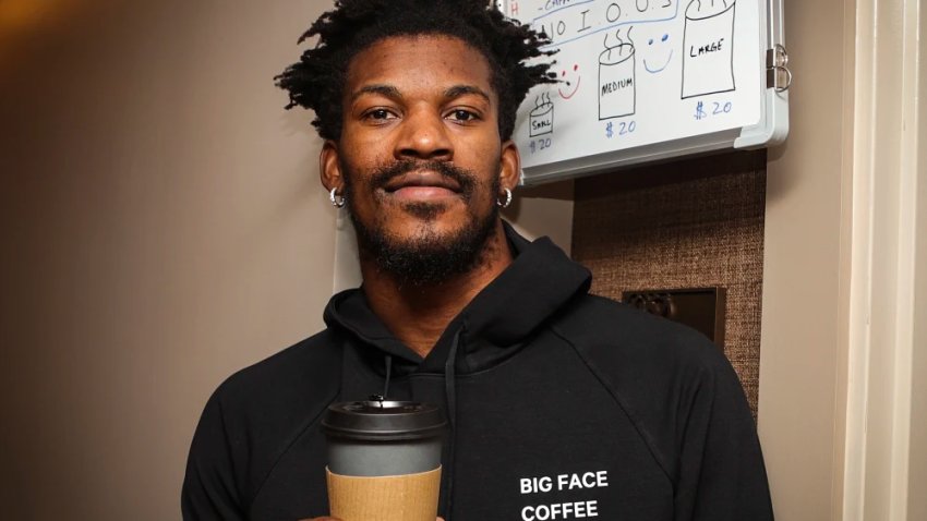 Jimmy Butler outside the door to “Big Face Coffee”