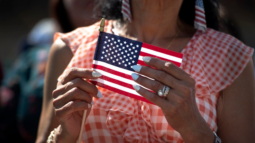 FILE - More than 2,100 people from 120 countries are naturalized as U.S citizens at Los Angeles Dodger Stadium on Aug. 29, 2022.