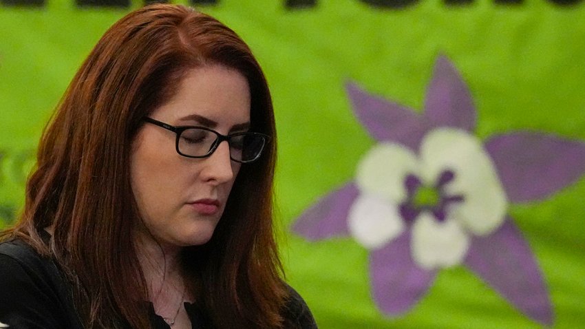FILE - Columbine High School shooting survivor Anne Marie Hochhalter attends a vigil for the 25th anniversary of the mass shooting, April 19, 2024, in Denver.