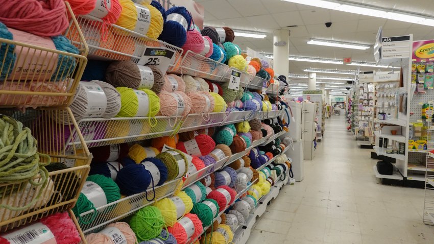 MIAMI, FLORIDA – FEBRUARY 13: Rolls of yarn fill a shelf in a JOANN Fabric and Crafts store slated to close on February 13, 2025 in Miami, Florida. The company announced it will be closing approximately 500 of its roughly 850 locations across the United States. (Photo by Joe Raedle/Getty Images)