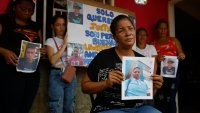 Mercedes Yamarte holds a picture of her son Melvin Yamarte, who was deported from US to a Salvadorean jail, in Maracaibo, Venezuela on March 18, 2025.