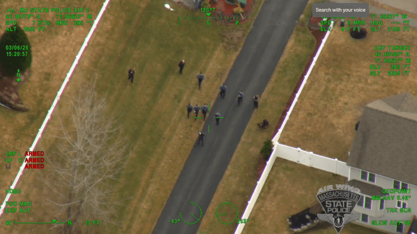 A man being arrested by a number of police in Clinton, Massachusetts, on Thursday, March 6, 2025.